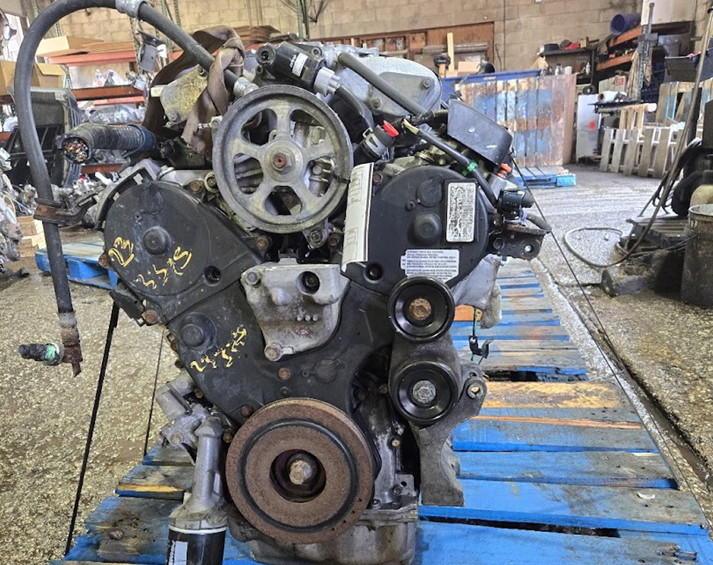Close-up inspection of a used engine at SNV Auto Parts